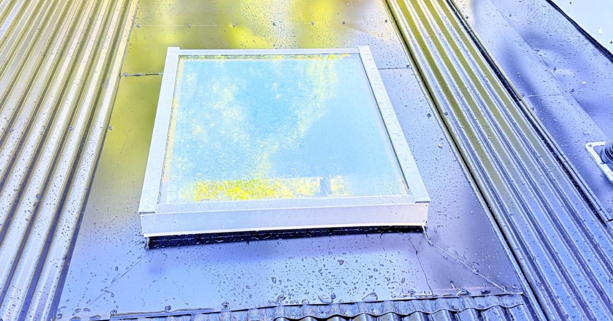 Professional Skylight Installation on a modern metal roof to bring natural light into the home.